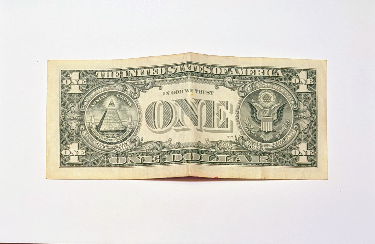 Pez one dollar note back "Smiling since 1999"